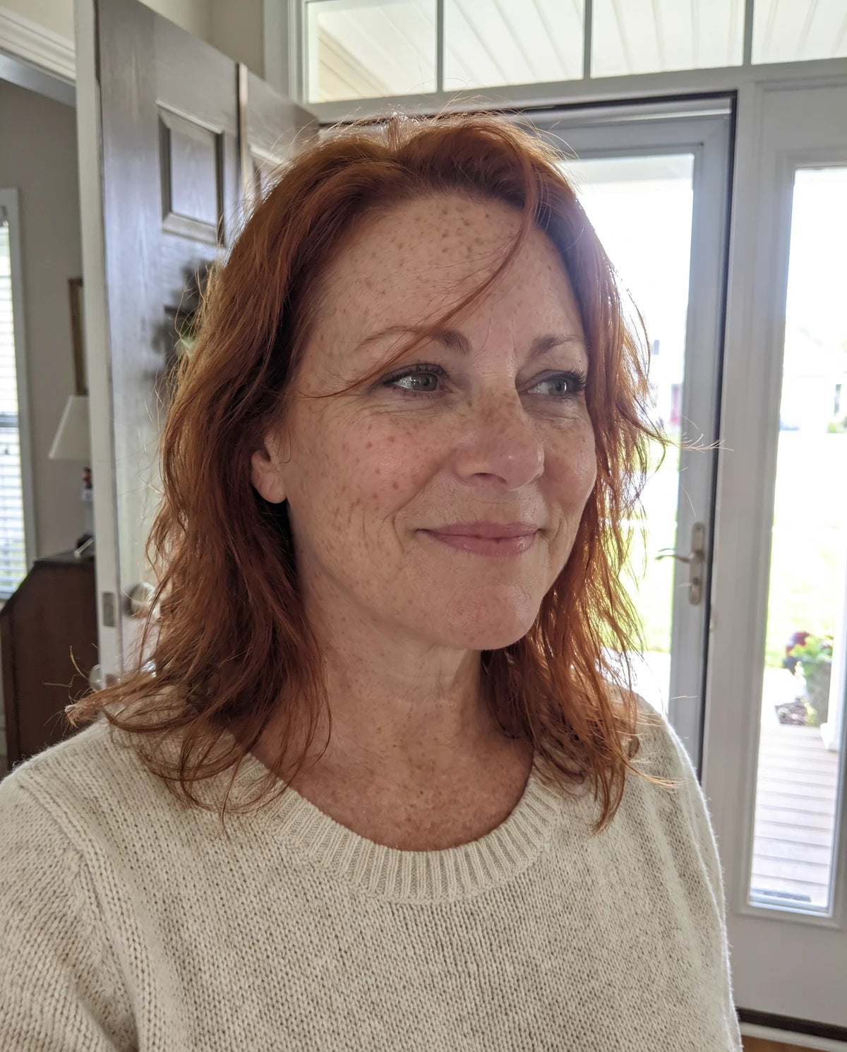 Illustrative candid phone portrait of Natalie, 46